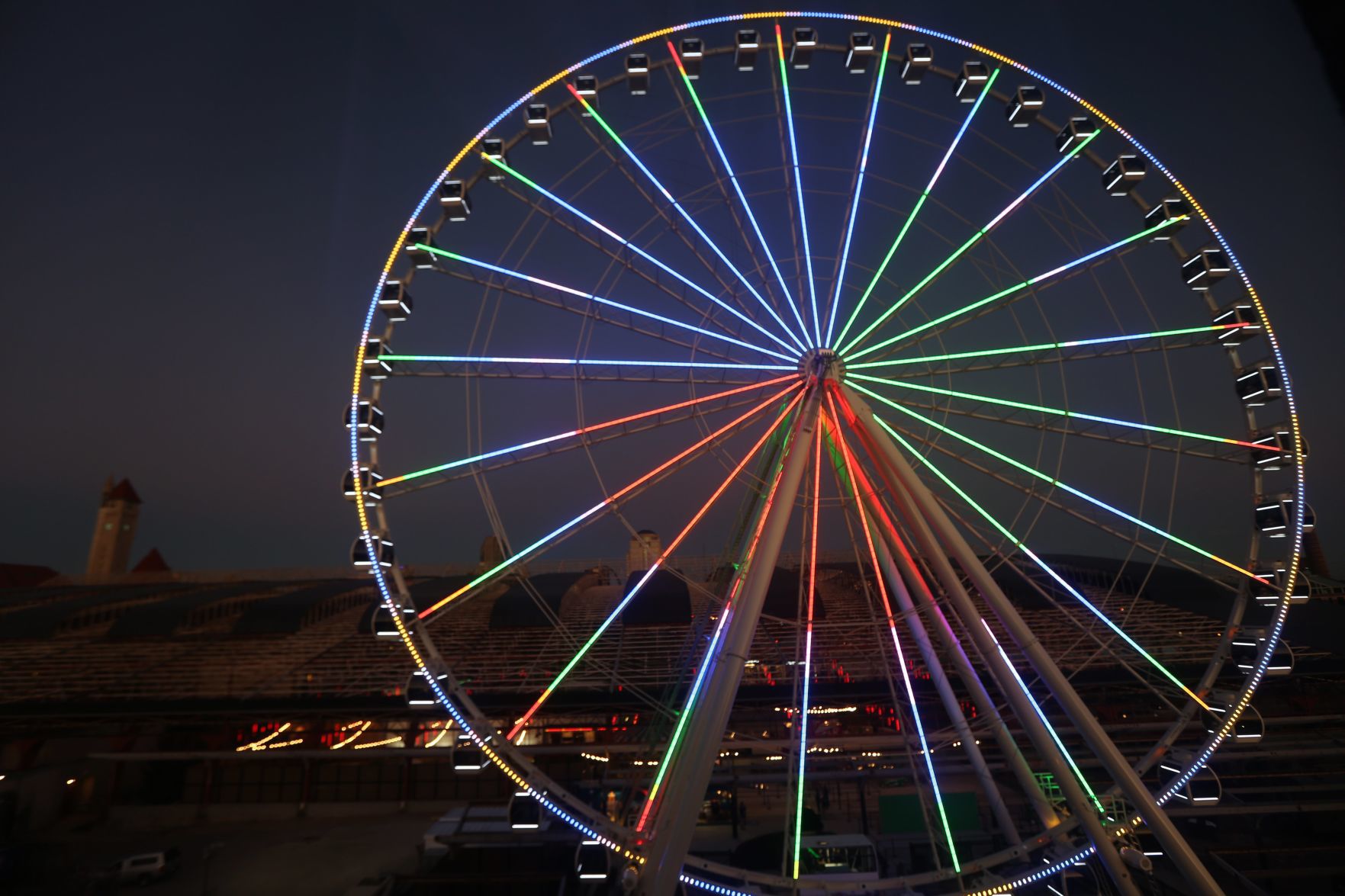 The St. Louis Wheel at Union Station lights up the sky